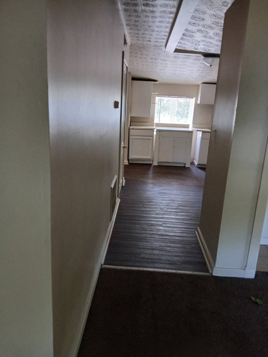 a look into the kitchen from the living room