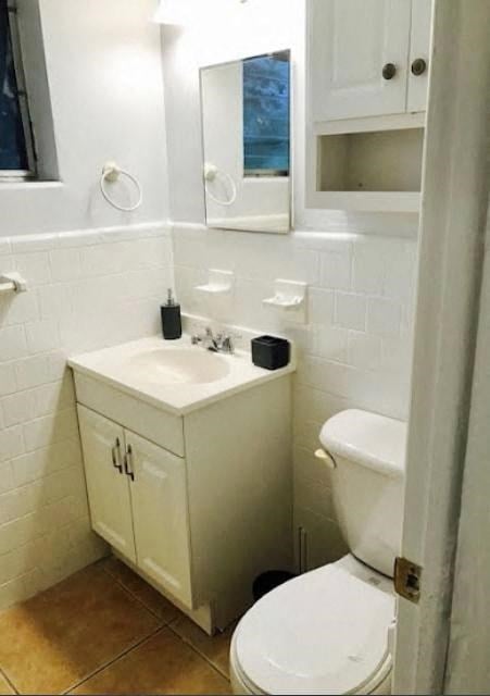 a small bathroom with a toilet and a sink