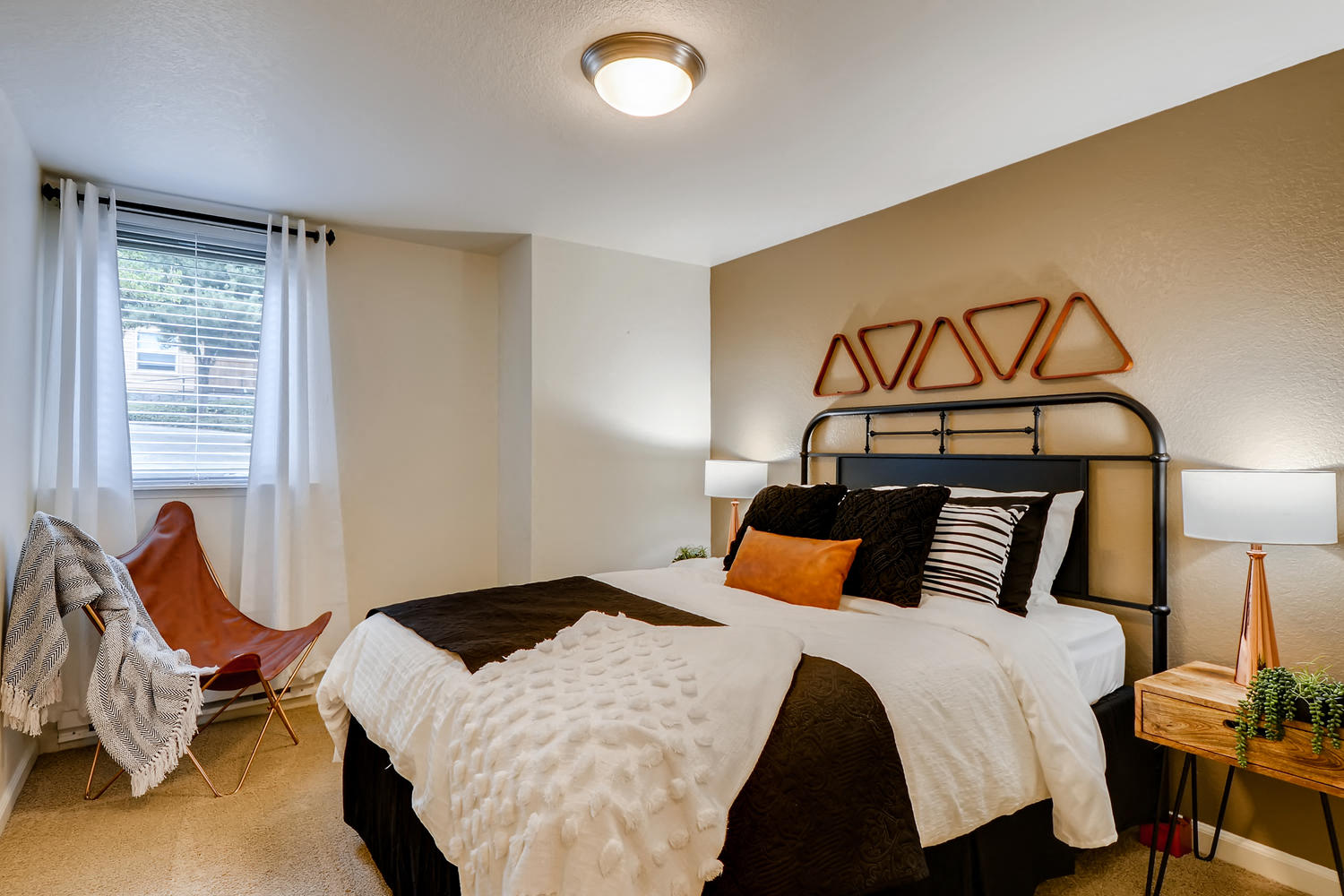 One Bedroom Apartments in Happy Valley, OR - Sunnyside Village Spacious Bedroom with Carpet Flooring and Large Window