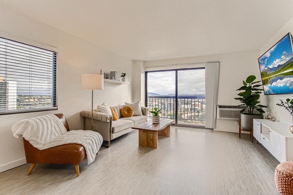 a living room with a couch and a table