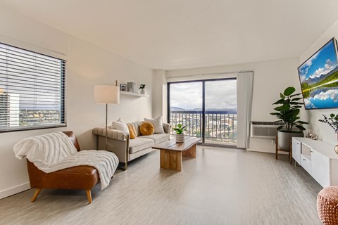 a living room with a couch and a table