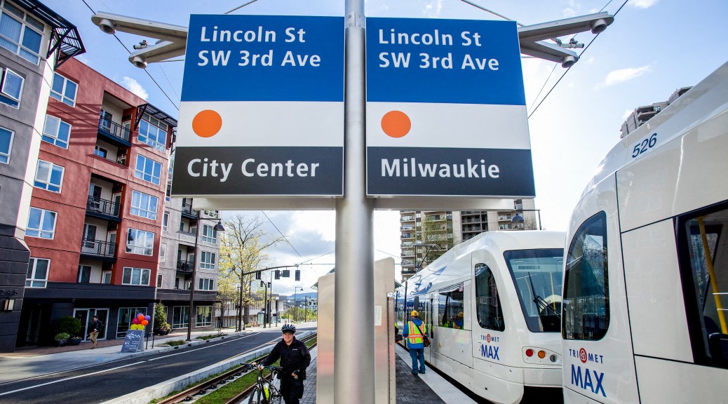 a train is stopped at the st sw 3rd ave train station