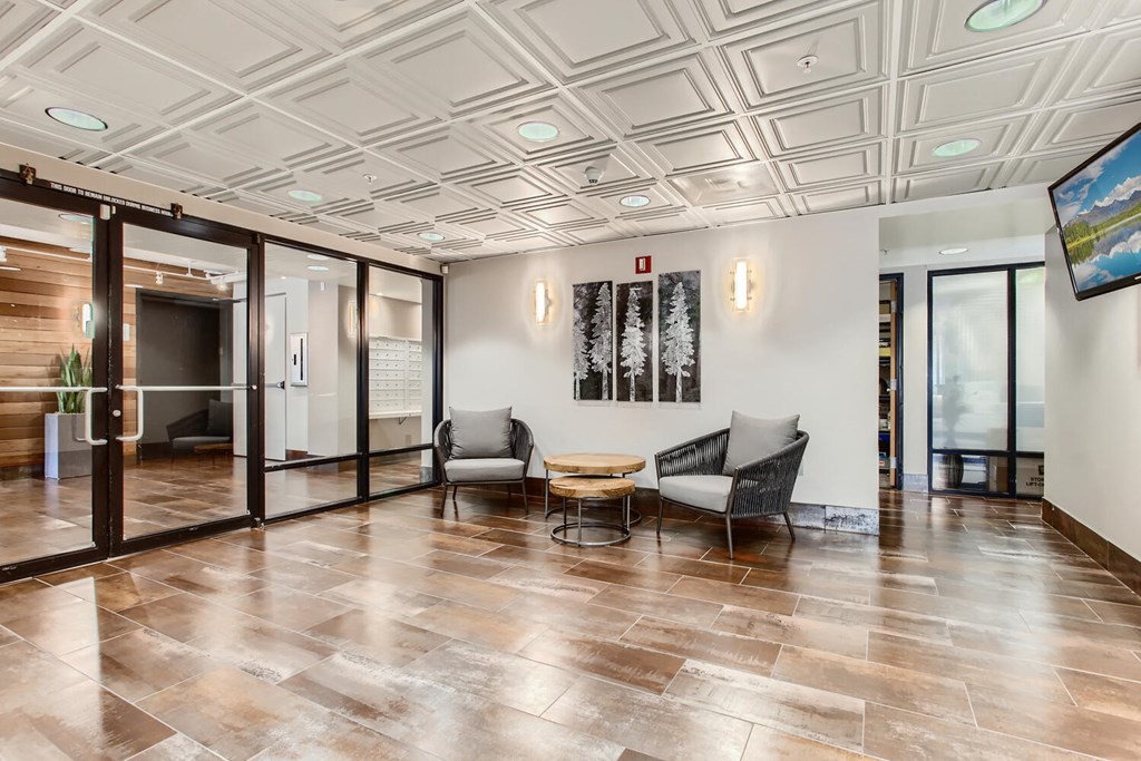 the preserve at cardinal courts lobby with chairs and a table
