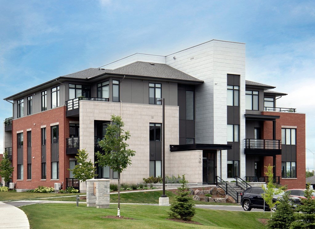 a large building with a car parked in front of it