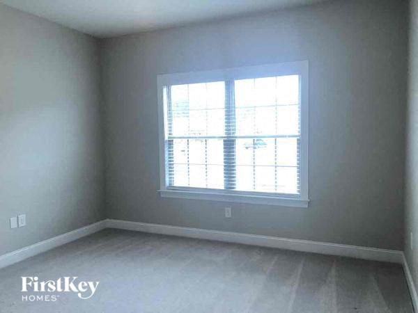 an empty room with a large window in it