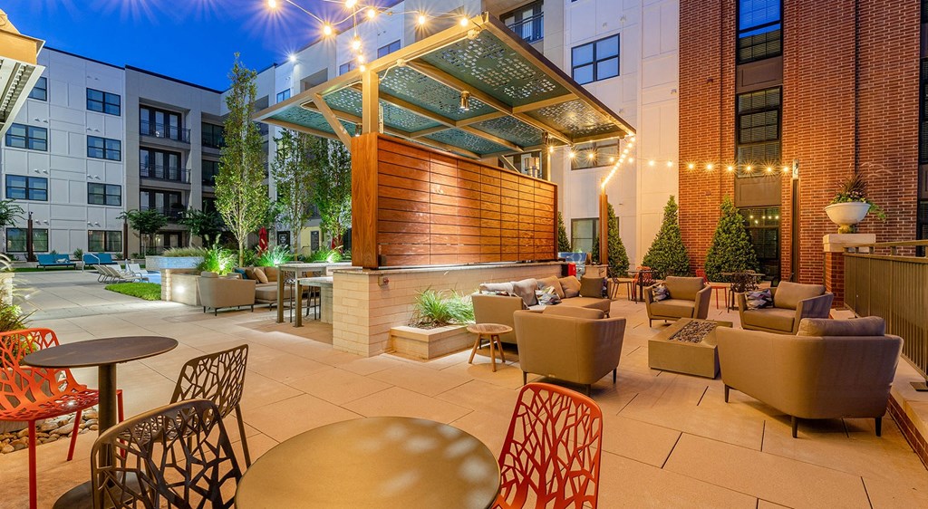 a rendering of a patio with tables and chairs