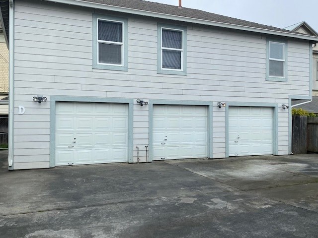A house with three garage doors.