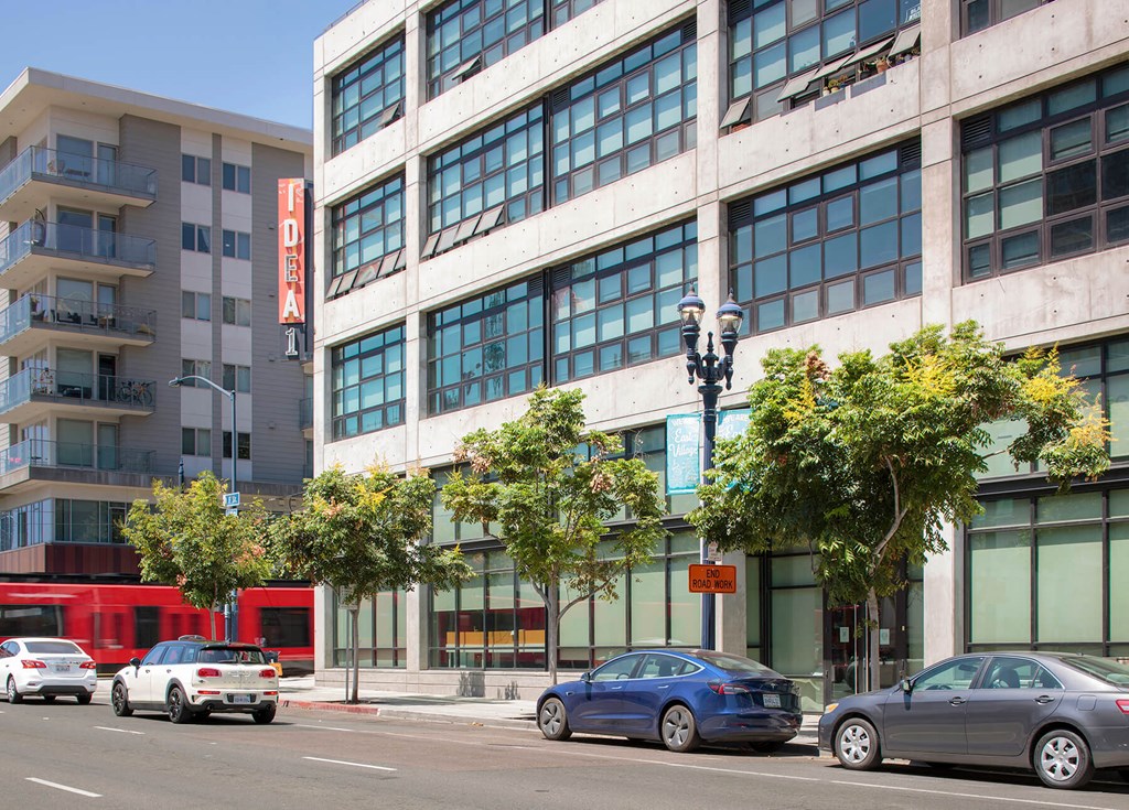 Exterior building with sign at Idea1 Apartments in in San Diego CA