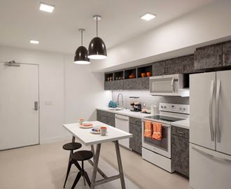 Modern finish kitchen with island at Idea1 Apartments in in San Diego CA