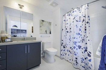 Model Concrete Bathroom at Idea1 Apartments in San Diego CA - Photo Gallery 32