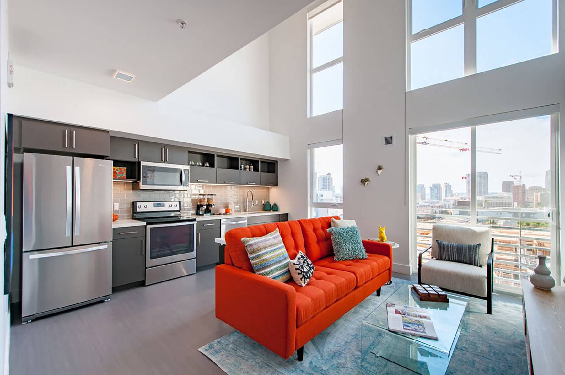 Model Loft Kitchen and Living Room at Idea1 Apartments in San Diego CA