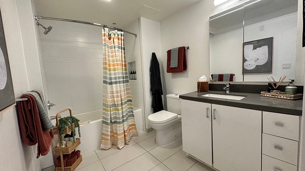 Bathroom in portal finish with shower tub at Idea1 Apartments in San Diego CA