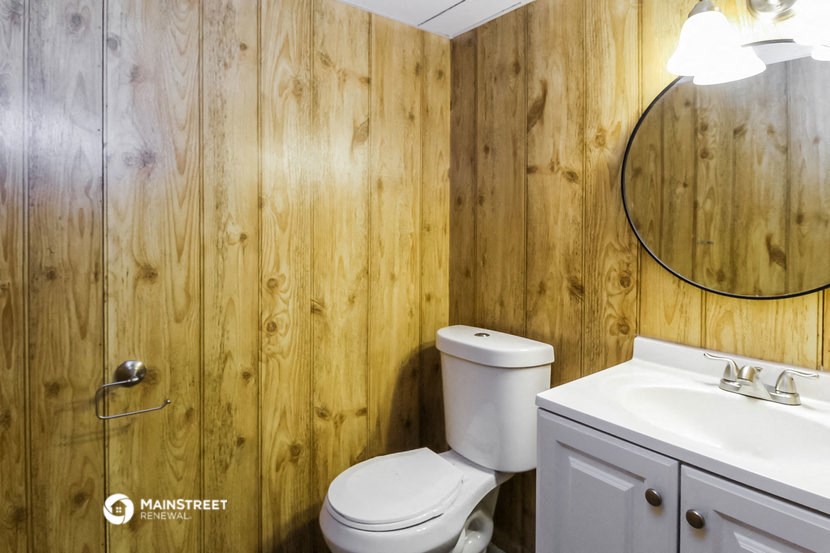 a bathroom with a toilet and a sink