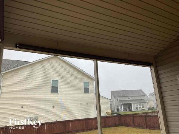 a view of a white house from a window
