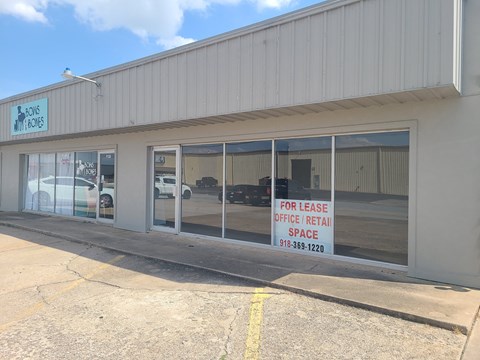 A building with a sign that says "For Lease" is shown.