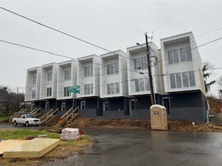 a building with a car parked in front of it