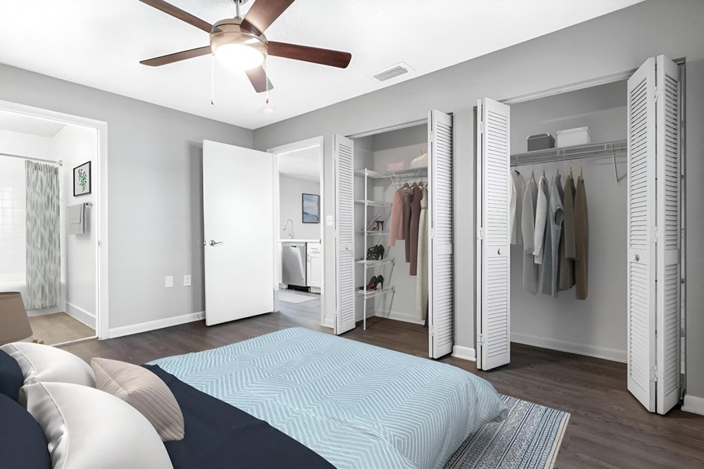 a bedroom with a bed and a closet