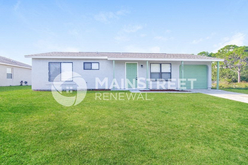 a house with a lawn in front of it