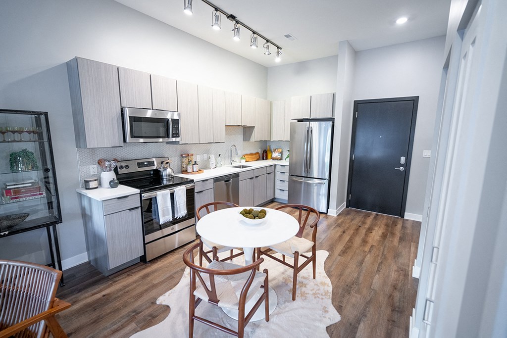 You are now viewing the kitchen and breakfast area in a model apartment  at Grand Flats, St. Louis, 63104
