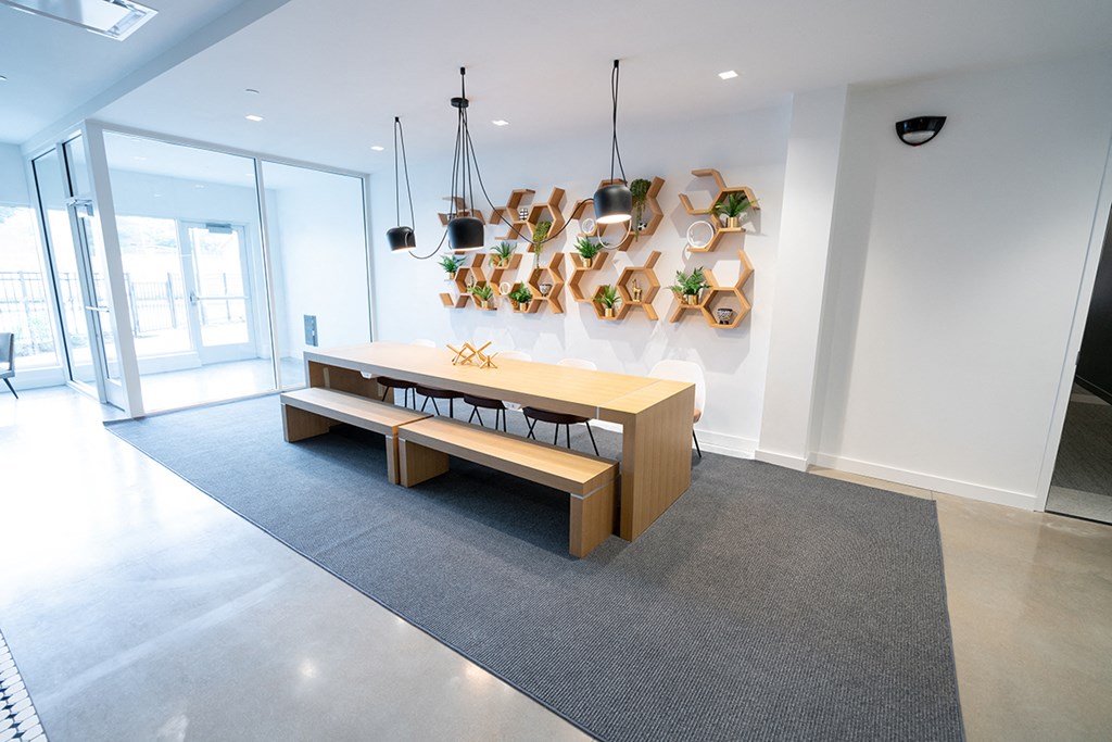 This is an alternate view of the conference table in the main lobby  at Grand Flats, St. Louis, MO, 63104