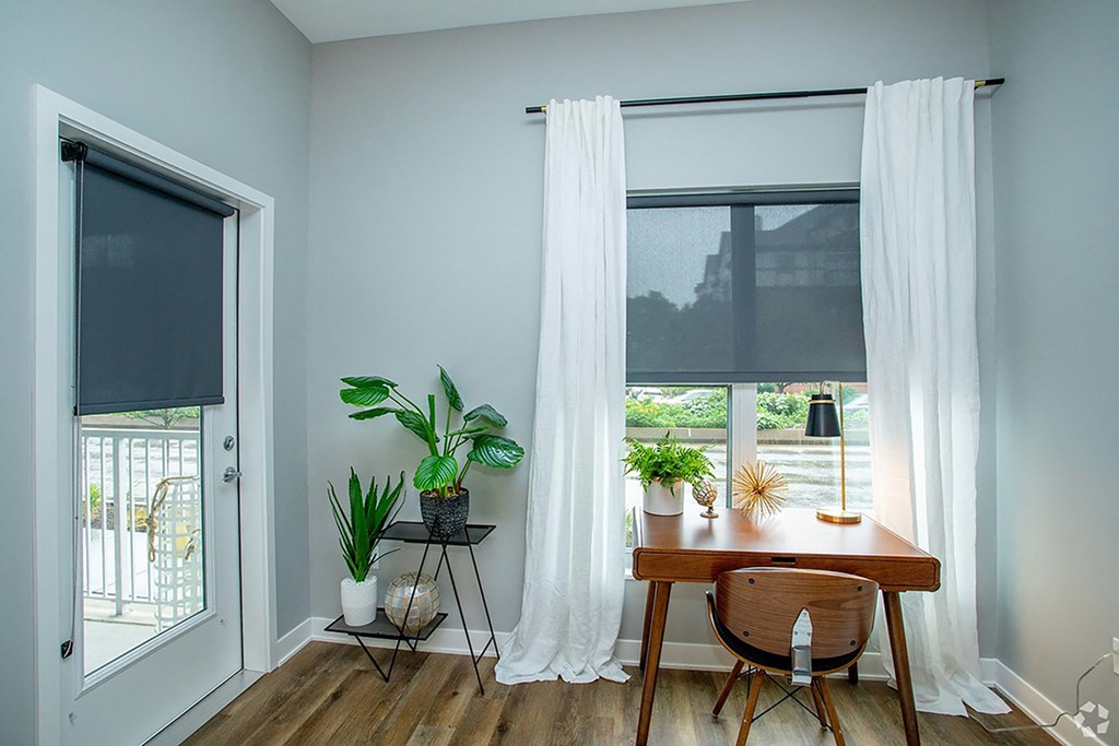 This is the living room view to the outside balcony  at Grand Flats, St. Louis, 63104