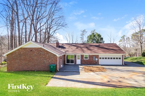 A house with a garage is for sale by FirstKey Homes.
