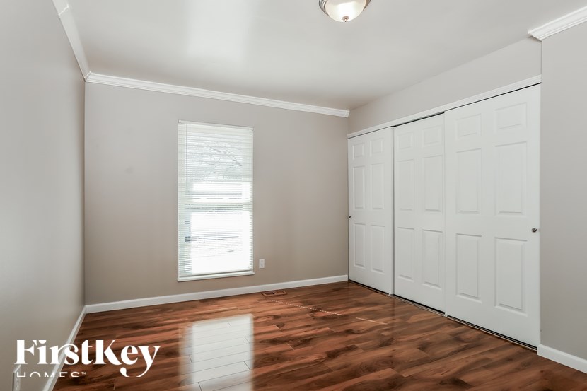 A room with a FirstKey logo on the bottom left corner.