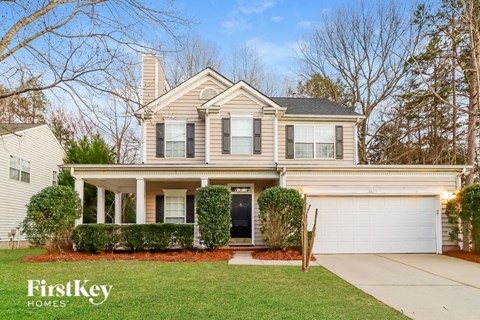 A house with a garage is for sale by FirstKey Homes.