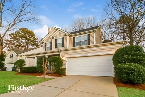 A house with a garage is for sale by FirstKey Homes.