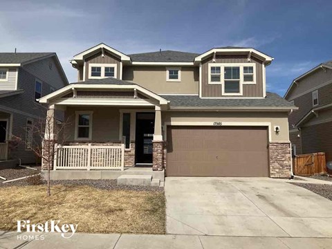 a house with a garage and a driveway