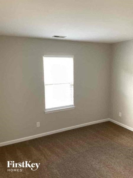 an empty room with a window in it