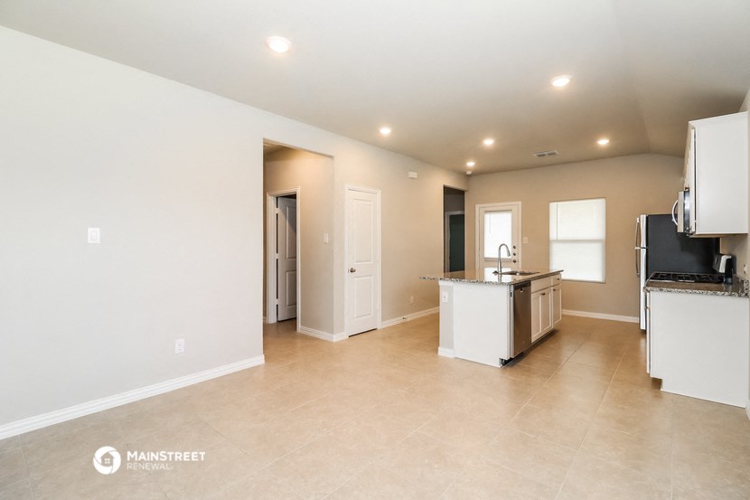 the kitchen and living room are spacious and ready for you to use