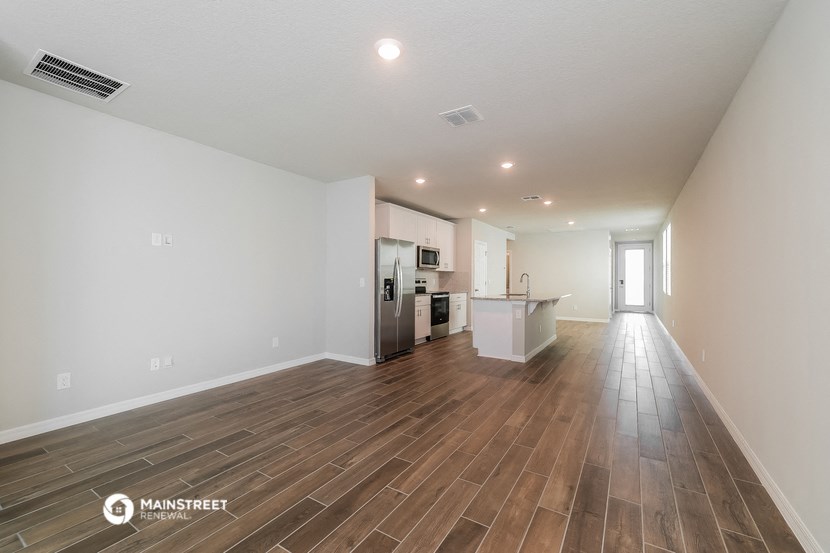 the living room and kitchen are spacious and open to the rest of the house