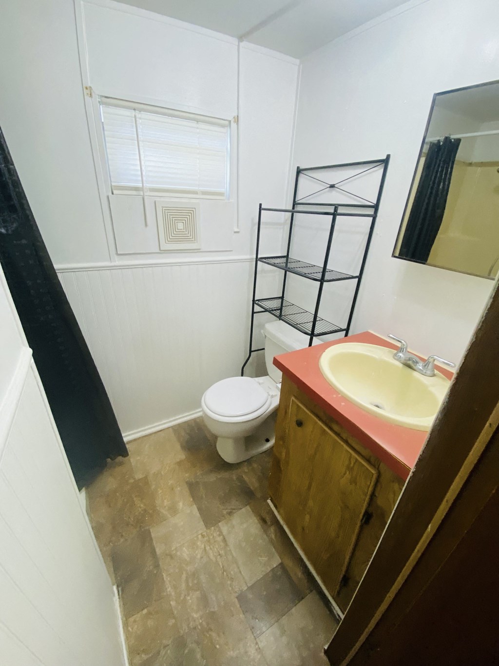 a small bathroom with a toilet and a sink