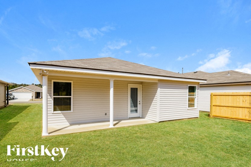 A house with a garage is for sale by FirstKey Homes.
