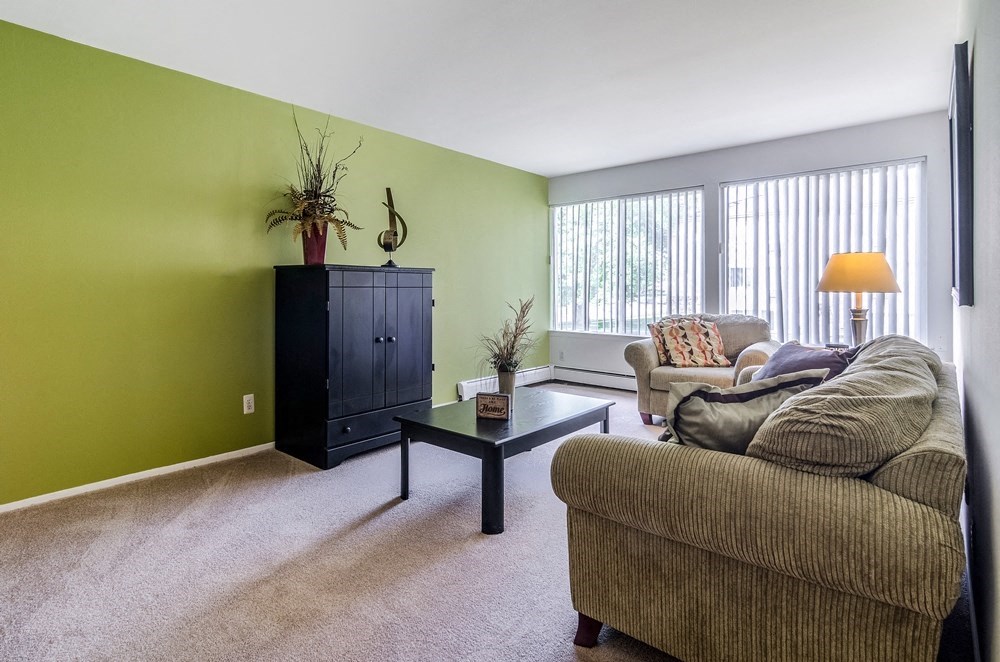 a living room with a couch and a coffee table