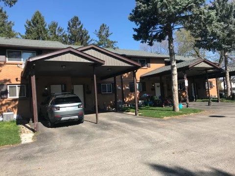 a house with a car parked in front of it