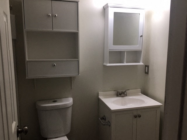 a small bathroom with a toilet and a sink