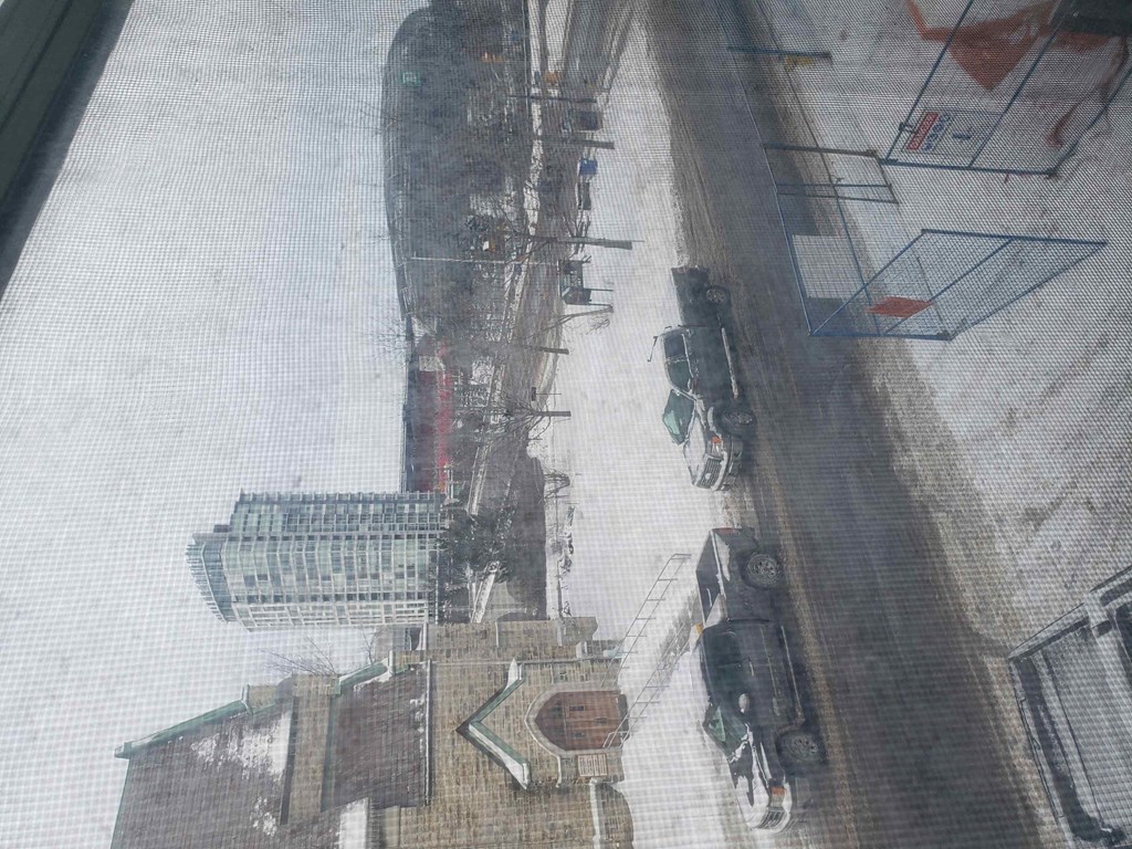 an aerial view of an airport runway with a train on it