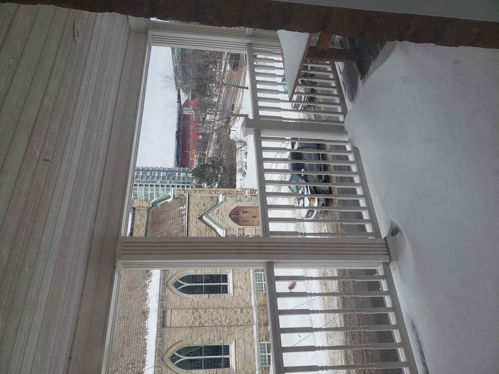 the view from the top of the stairs in a tall building