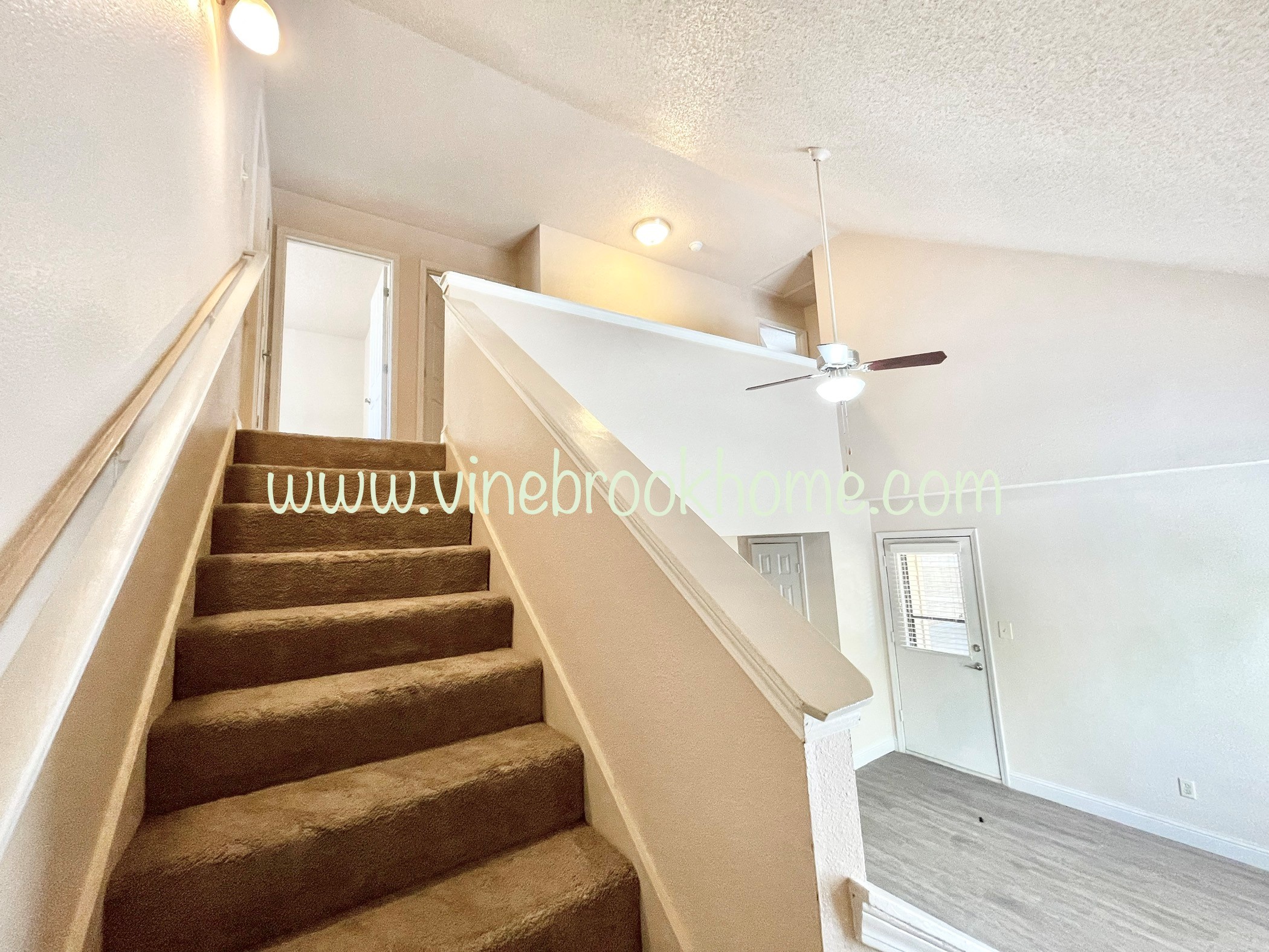 the stairway up to the second floor of the house