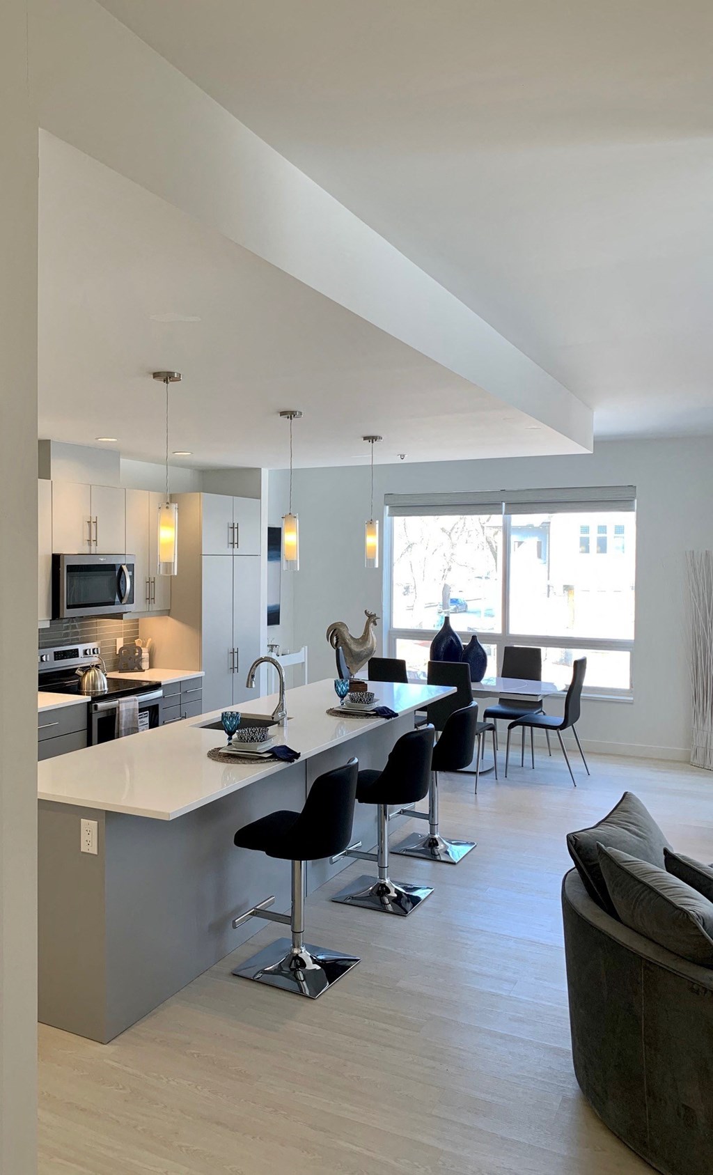 a kitchen and living room in a house
