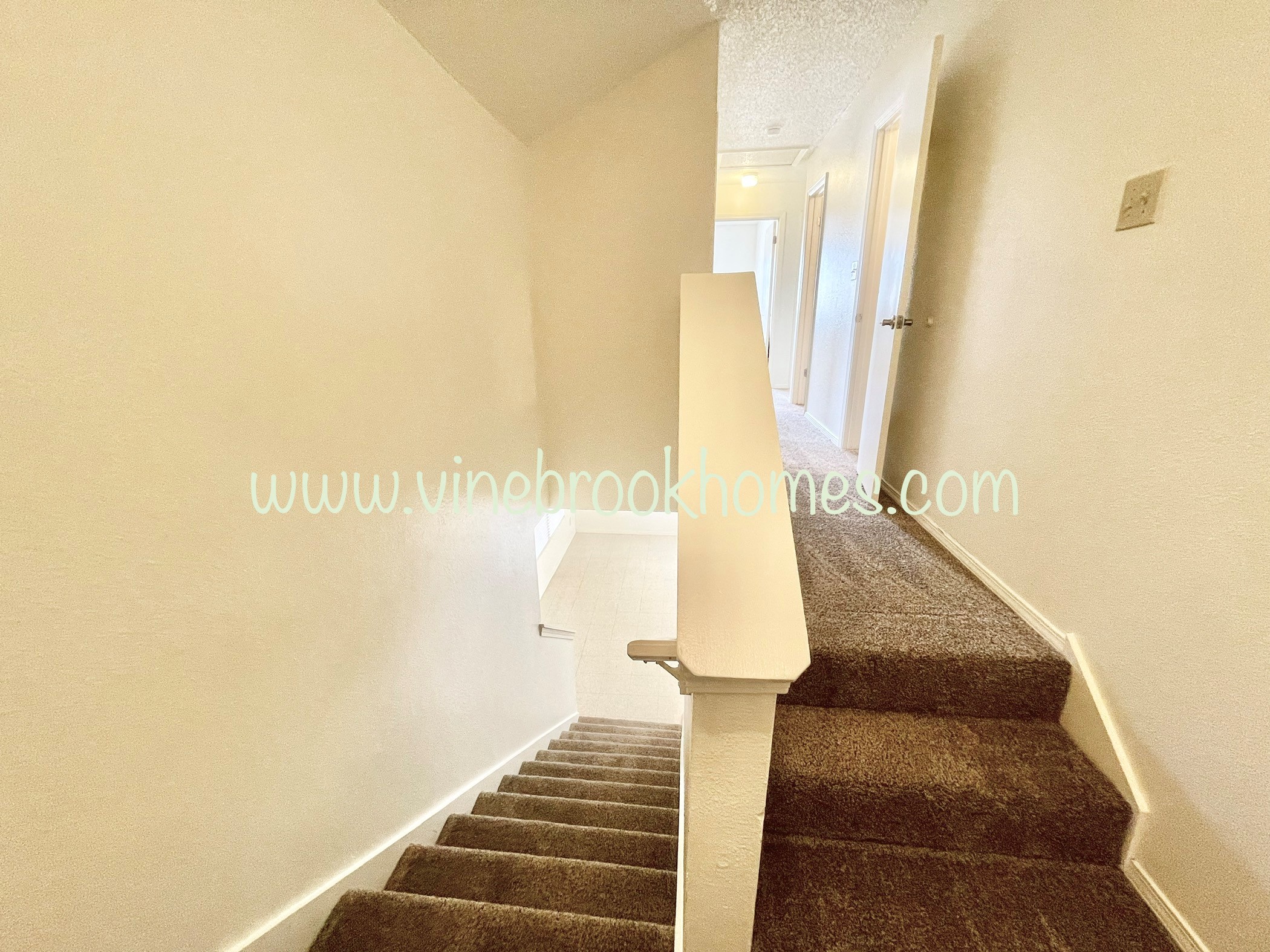 the stairway up to the second floor of the house