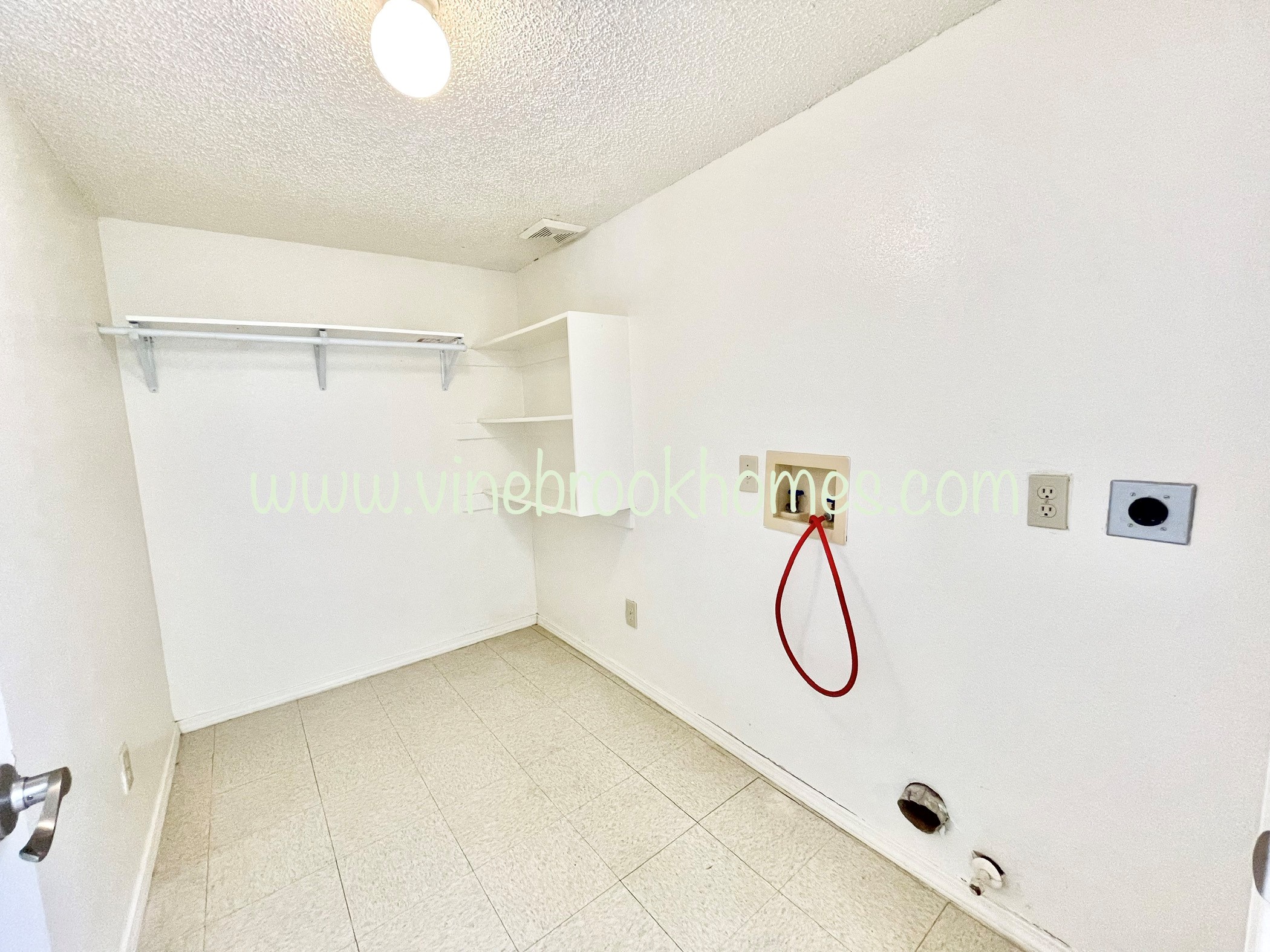 two closets in the bathroom of an apartment