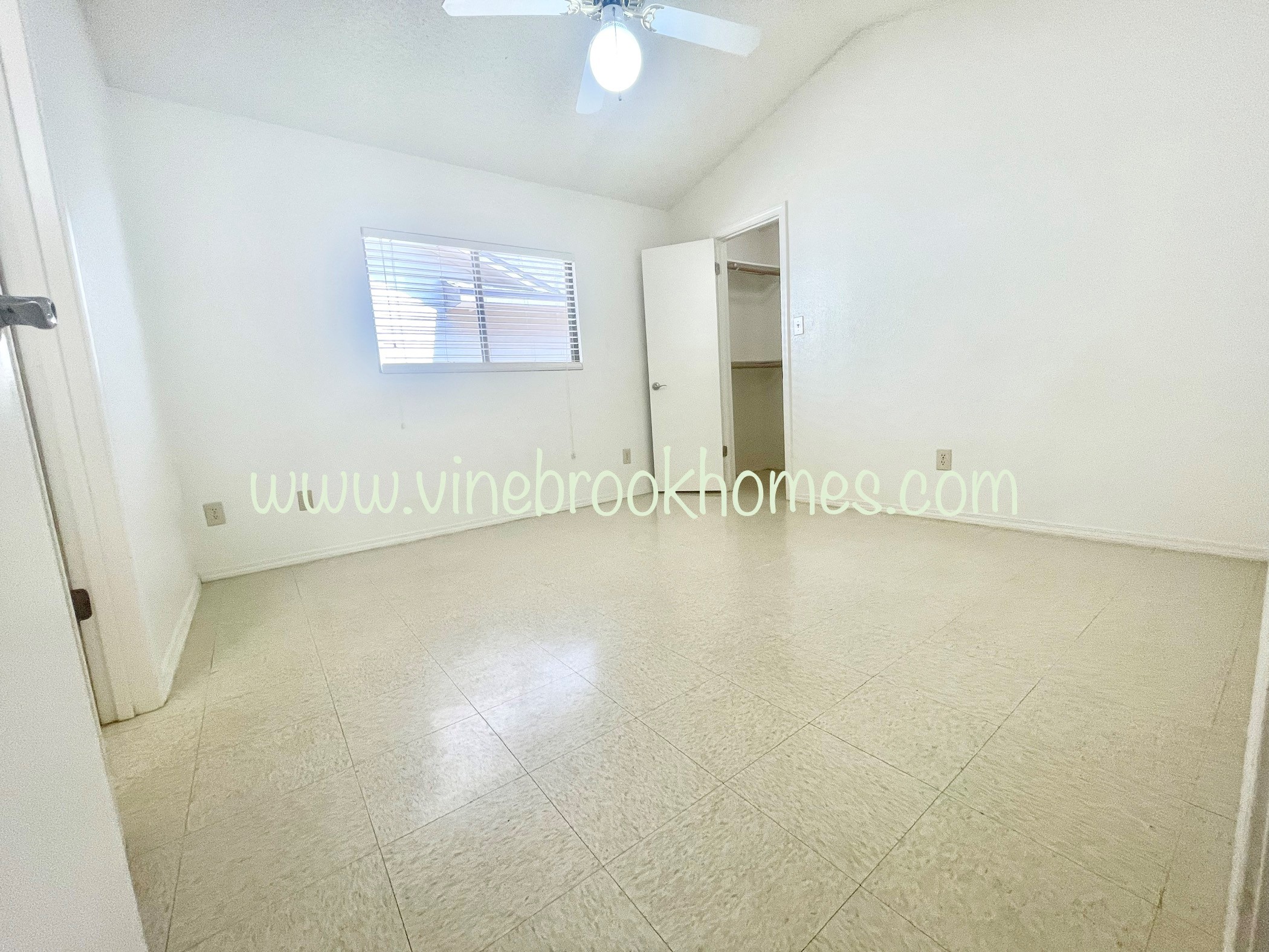 two bedroom apartment with a living room and a closet