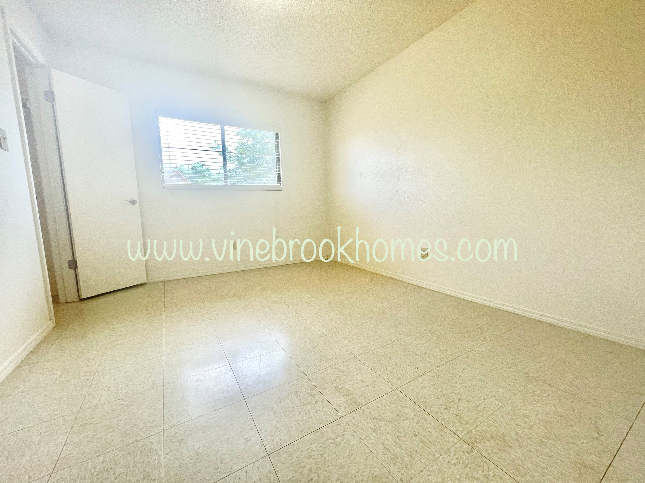 two bedroom apartment with a living room and a closet