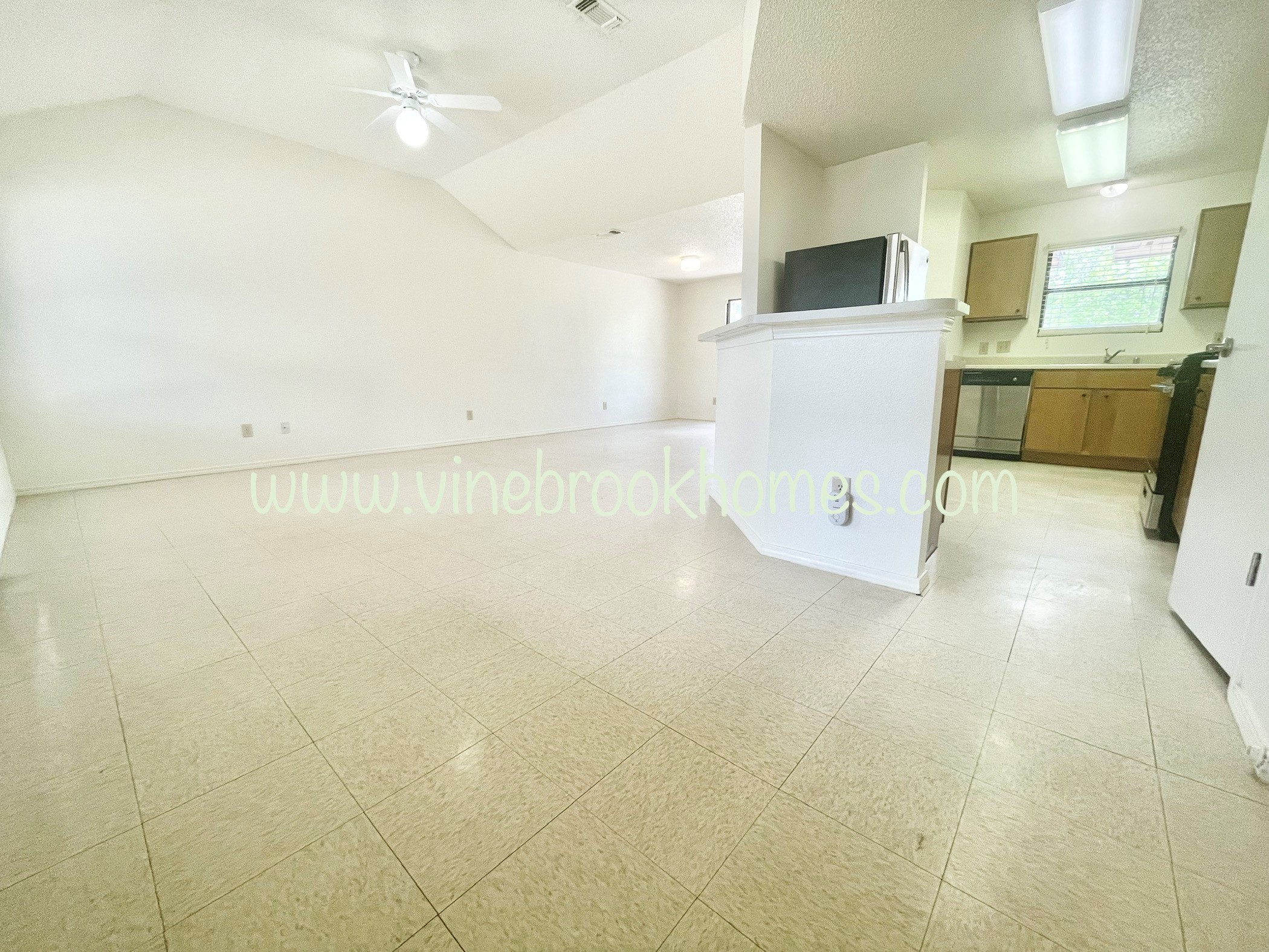 two bedroom apartment with a kitchen and a living room