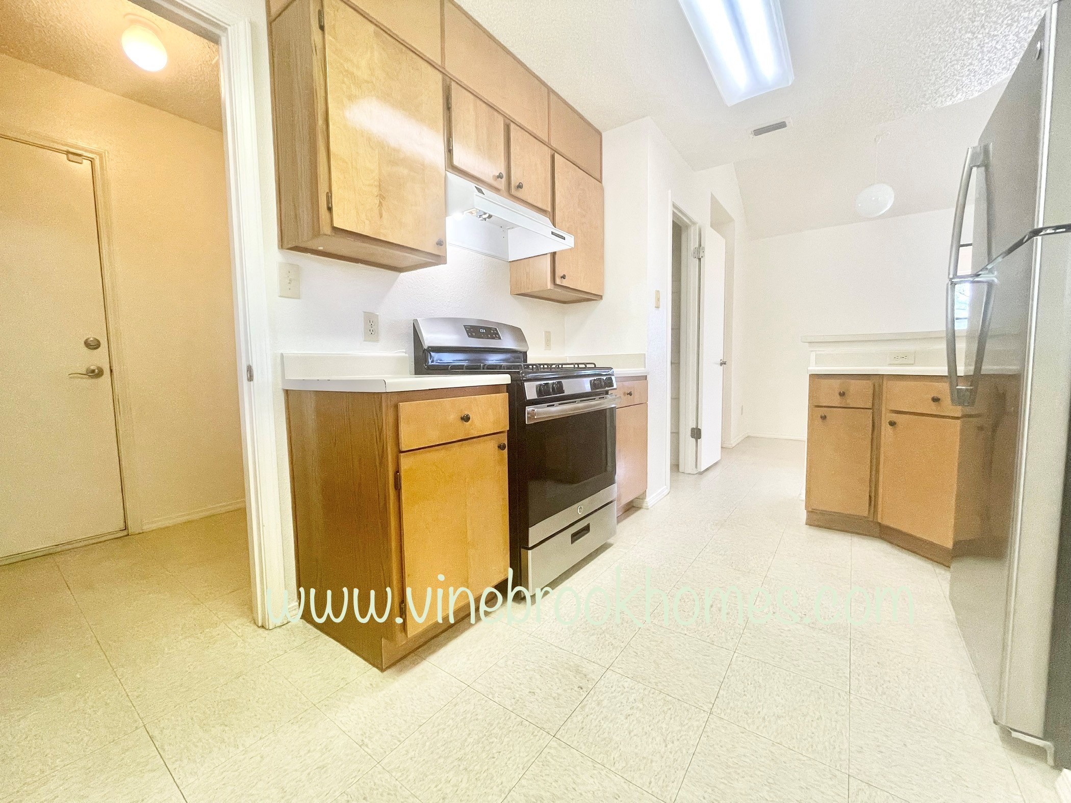two closets in the kitchen of an apartment