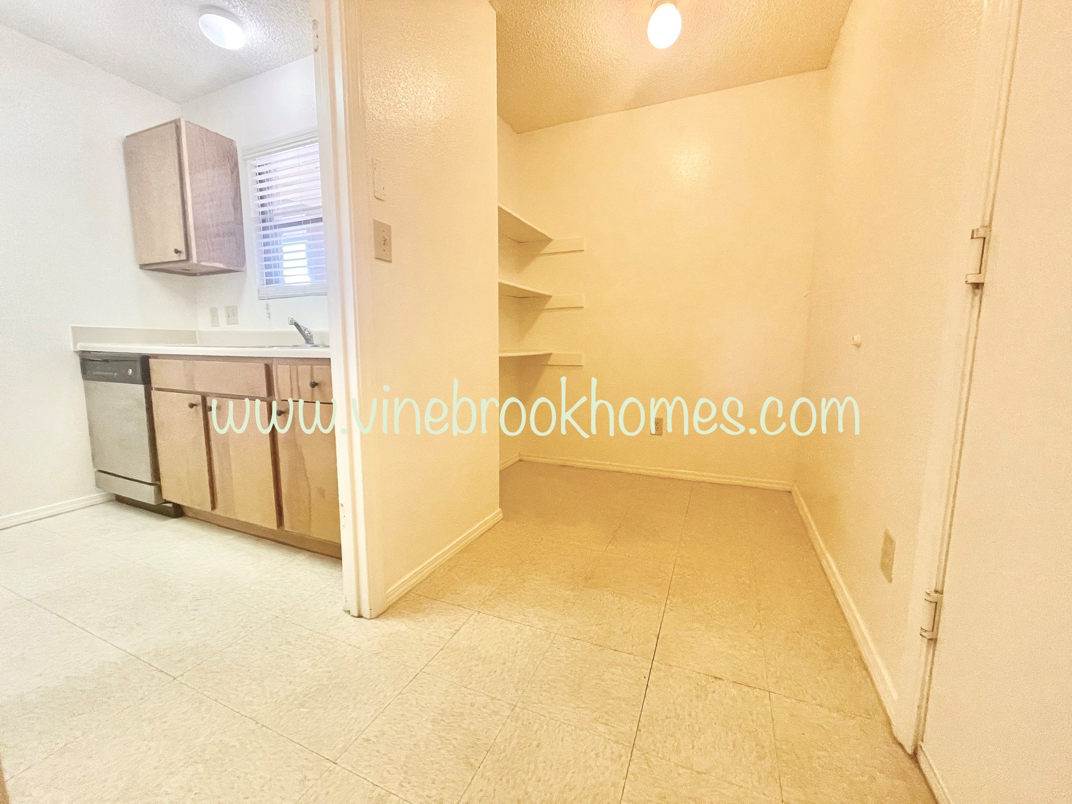 two bedroom apartment with a kitchen and a living room