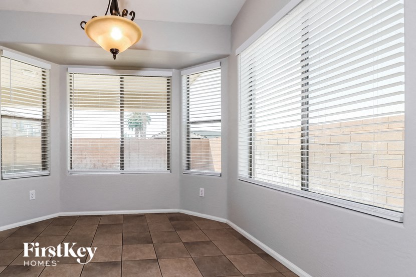 A room with a FirstKey Homes logo on the floor.